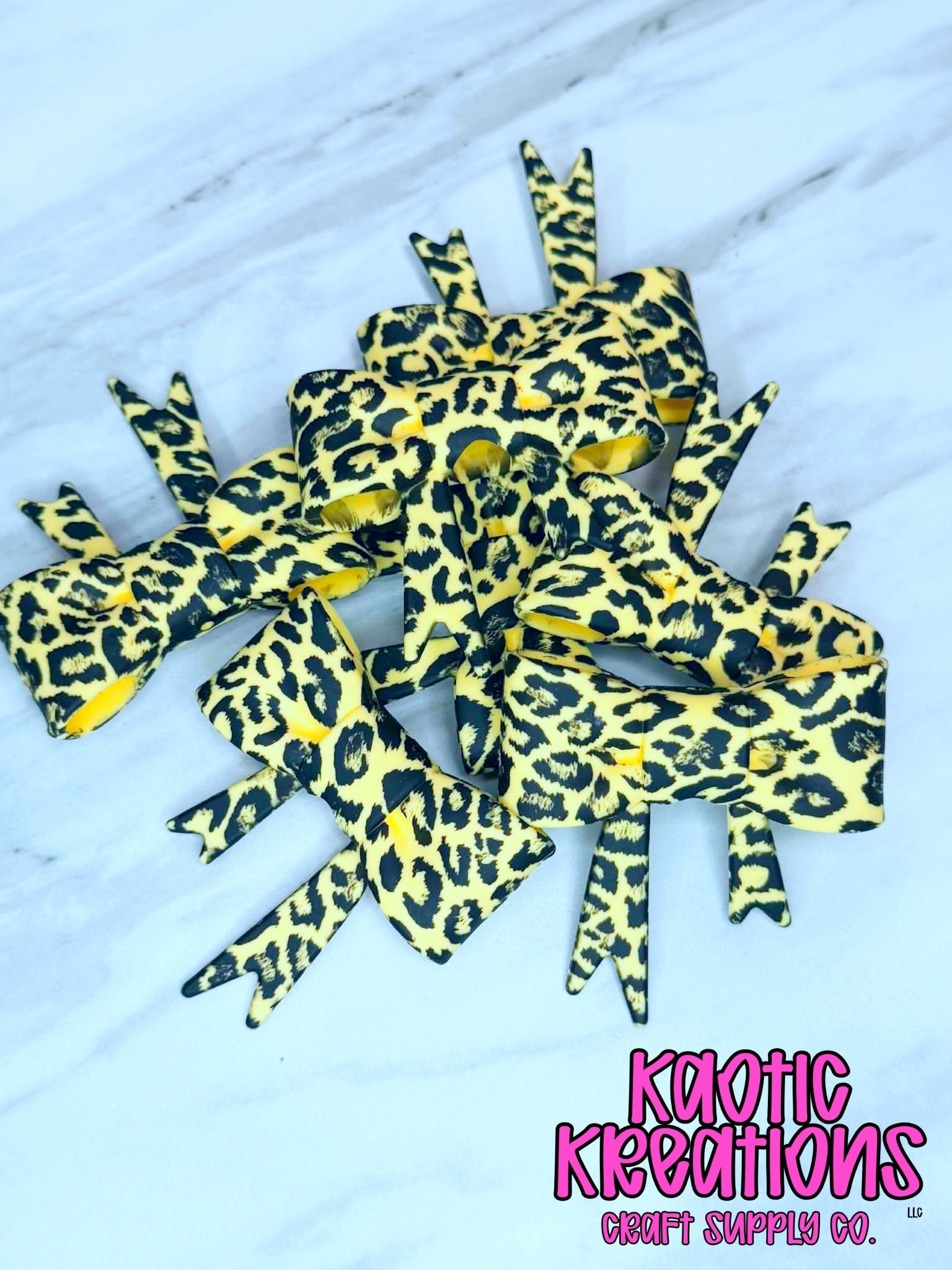 D66 BEADABLE JUMBO SILICONE BOW YELLOW LEOPARD (1ct)