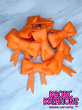 D48 BEADABLE JUMBO SILICONE BOW SOLID ORANGE (1ct)