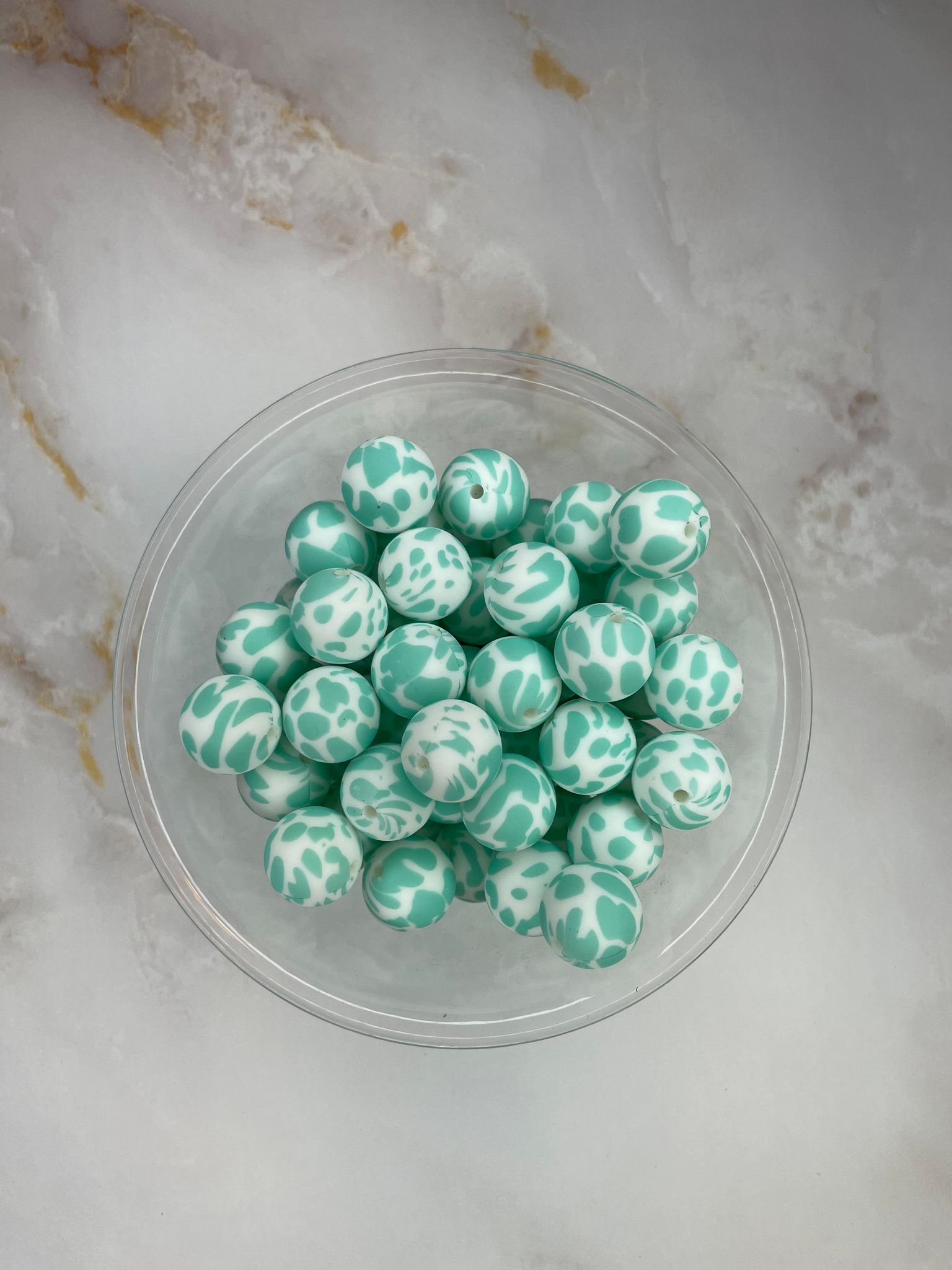 P171 TURQUOISE COW 15MM PRINT (10ct)
