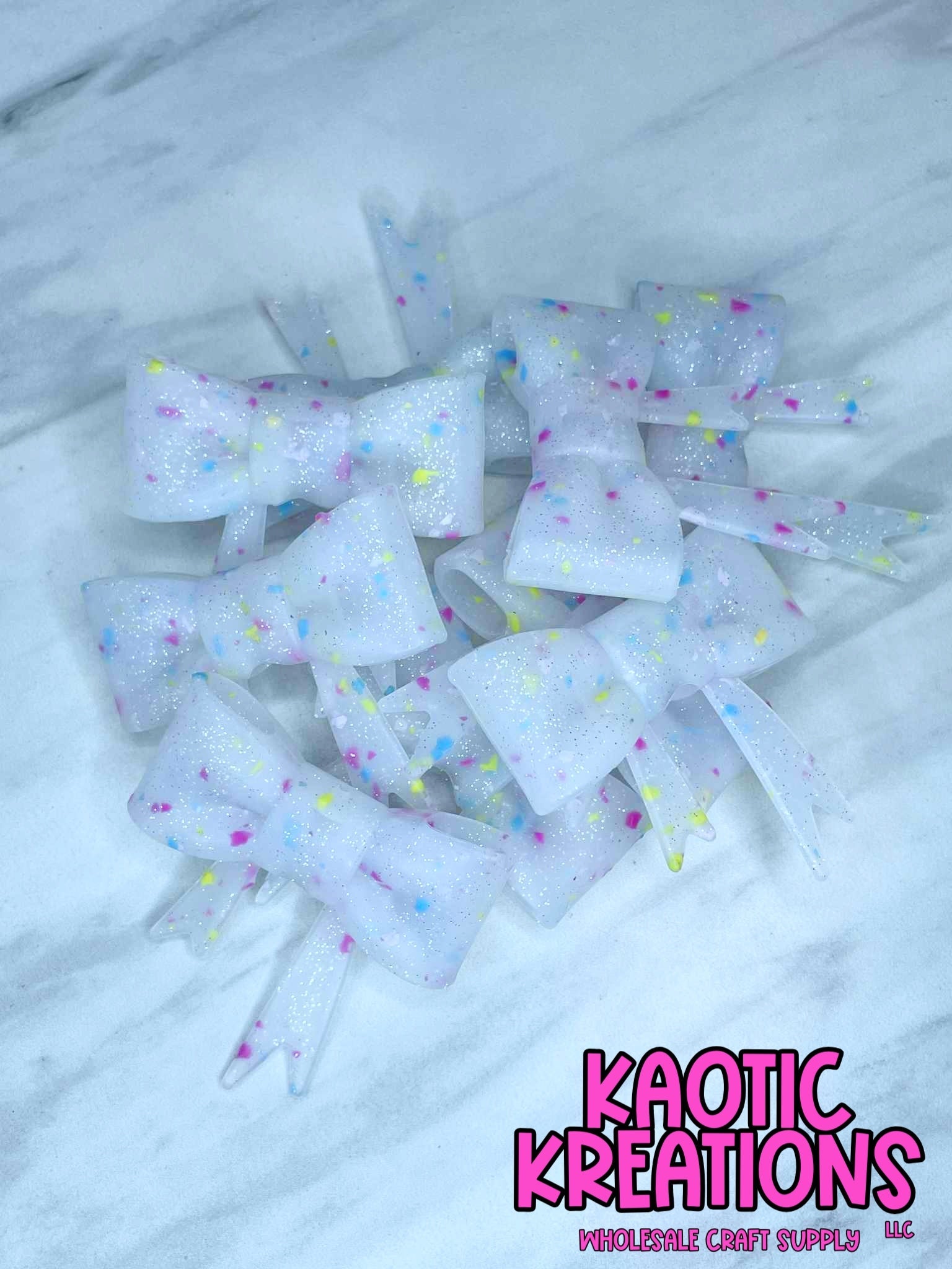 D98 BEADABLE JUMBO SILICONE BOW BIRTHDAY CONFETTI GLITTER (1ct)