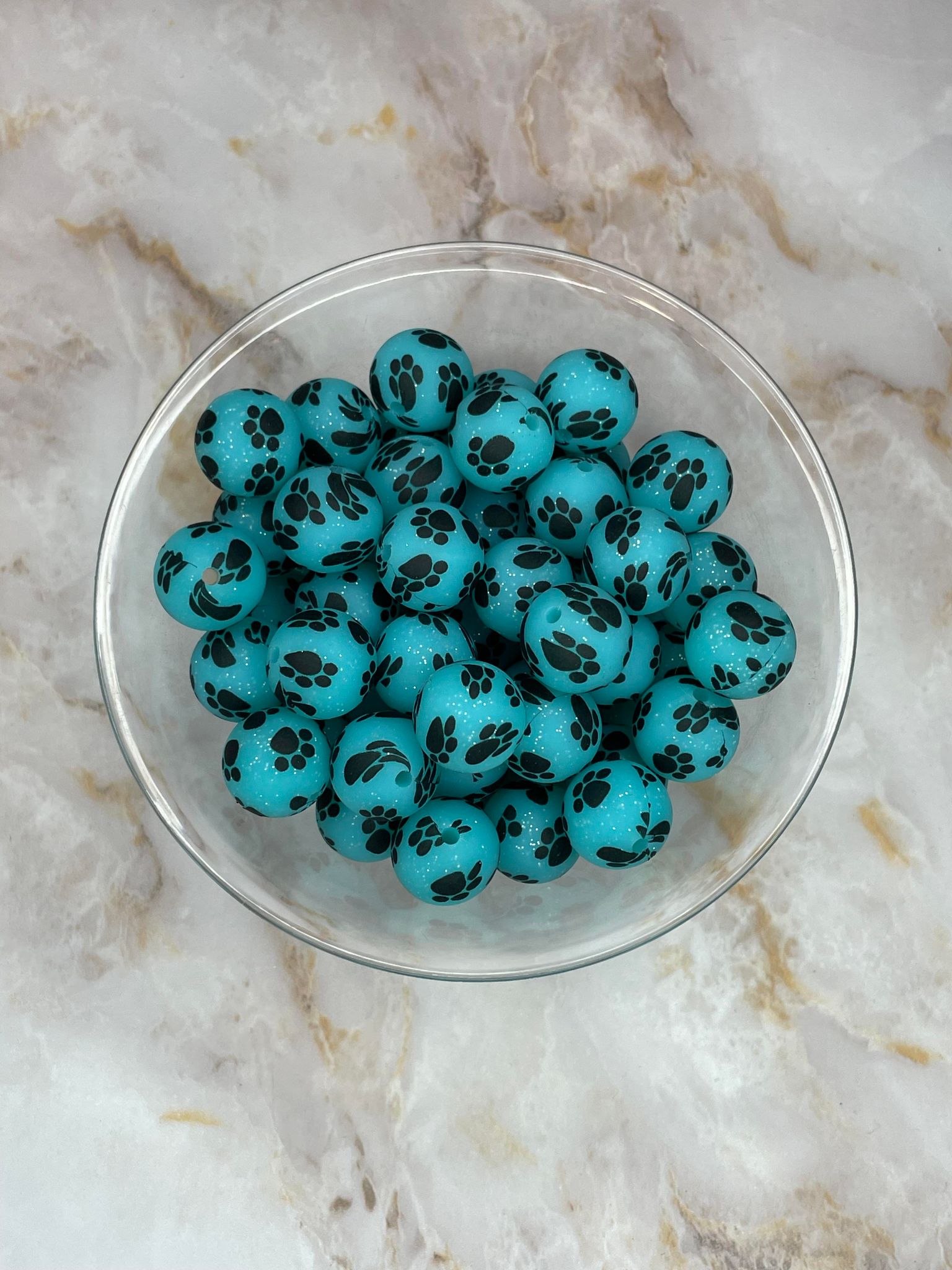 P18 TURQUOISE GLITTER PAW 15MM PRINT (10ct)