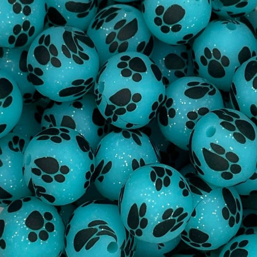 P18 TURQUOISE GLITTER PAW 15MM PRINT (10ct)