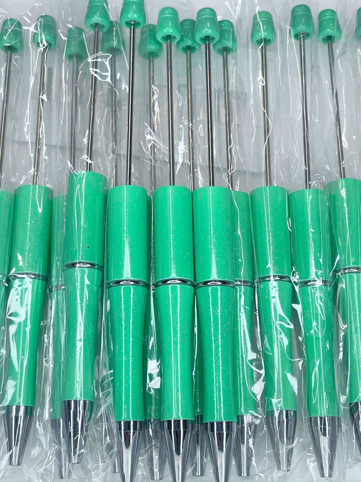 BEADABLE PLASTIC PEN GLITTER TURQUOISE B27 (1ct)